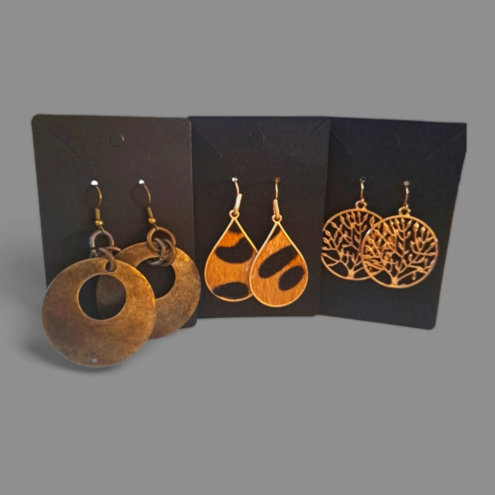 3 pairs of dangling earrings.
